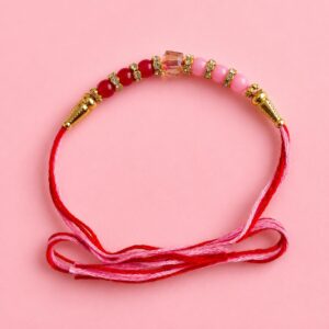 Rakhi With Pink And Red Stones